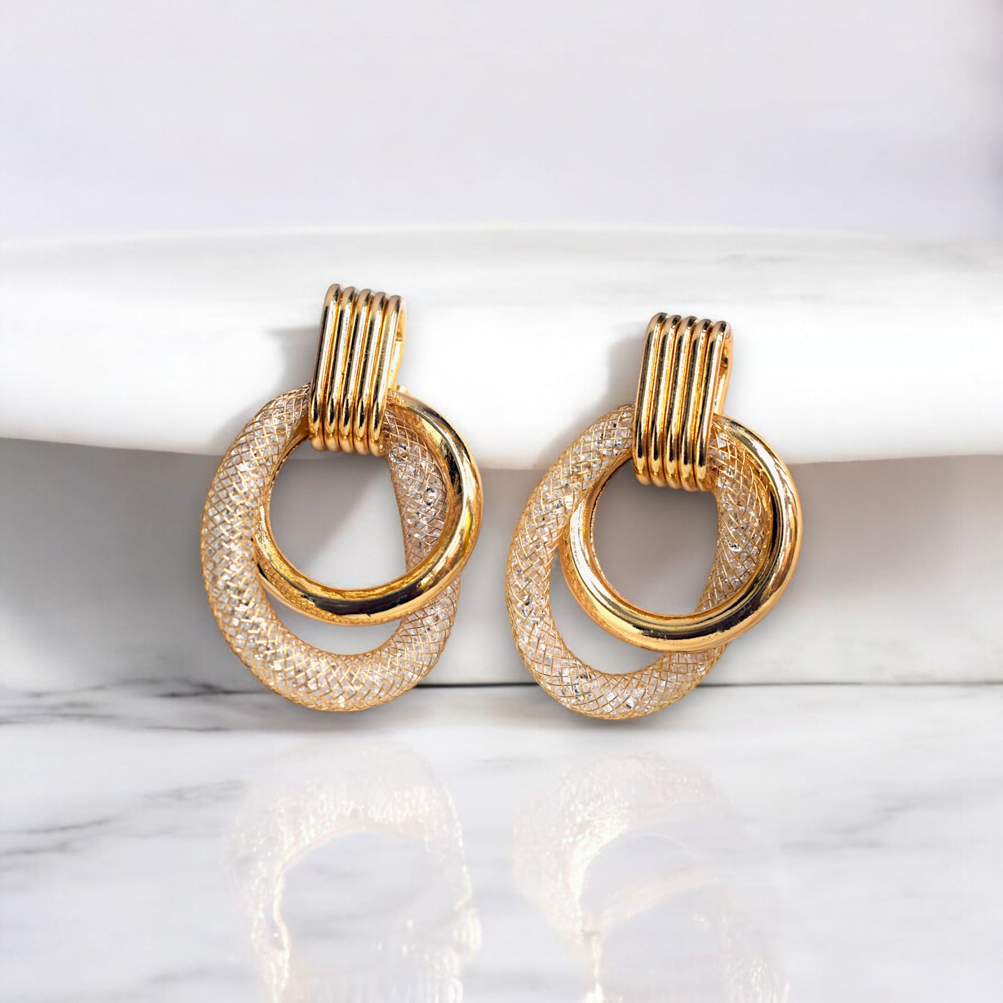 14K gold color plated hoop earrings with sparkling zirconia diamonds in a sleek, modern design