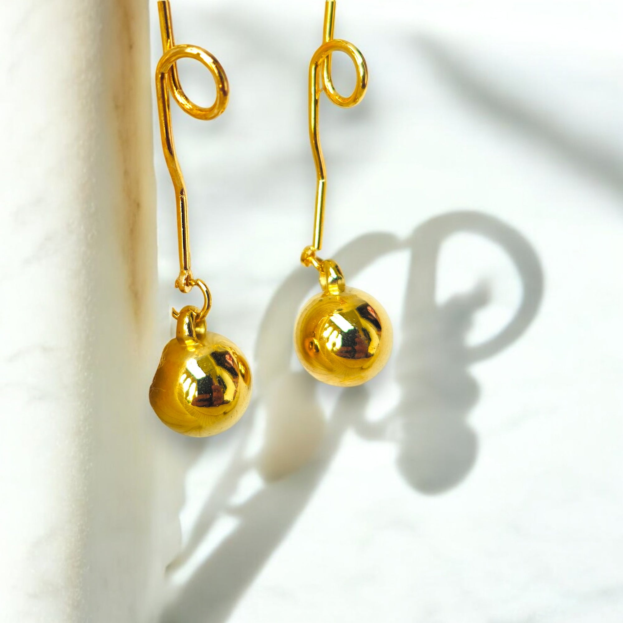 Gold-plated dangle earrings with a minimalist orb design Korean jewels