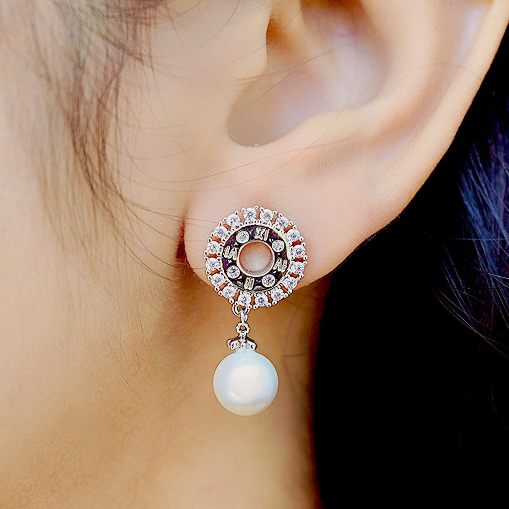 side view of a girl wearing a zirconia stone studded silver earring