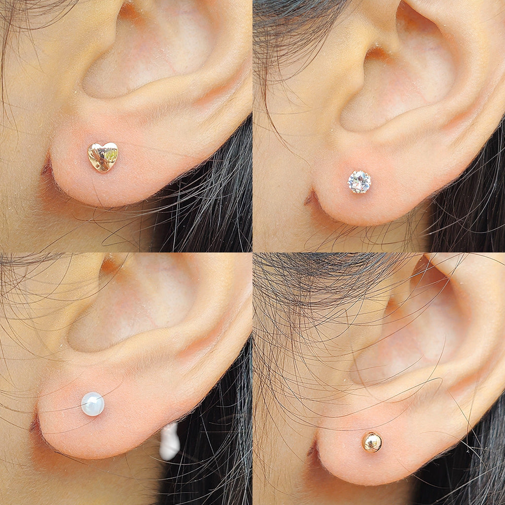 Collection of four studs from kansobi worn by a girl